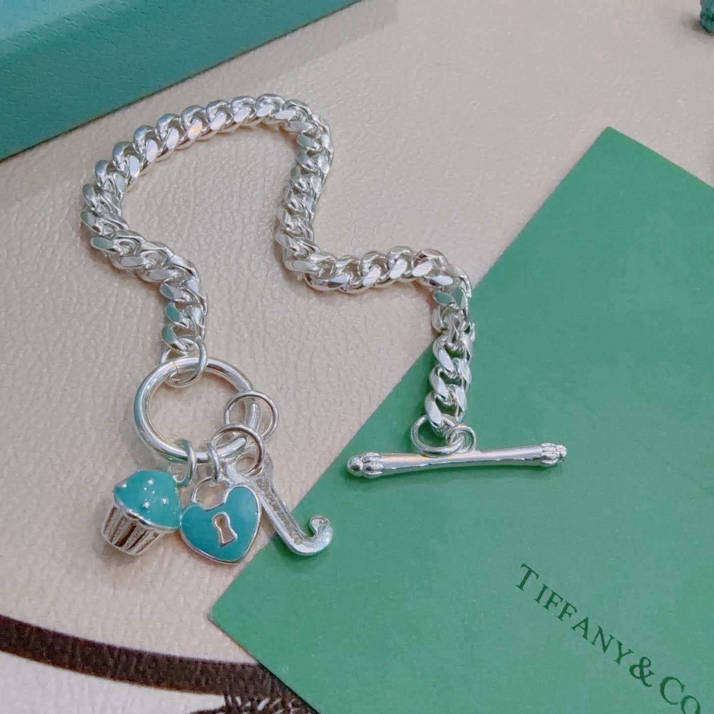 Tiffany & Co. Sterling Silver Heart Bracelet with Charms